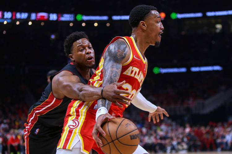 热火主场胜篮网，巴特勒三双表现